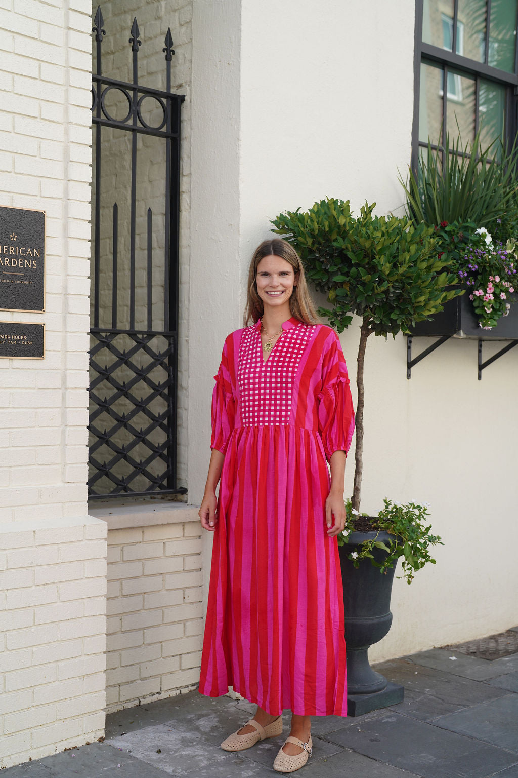 madison matthews dresses Mathews April Maxi in Sage Botanical Vine creating a captivating silhouette and adding a playful twist to the ensemble Folly Dresses Shop Madison